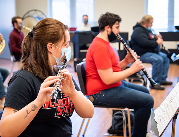 Students of the band lab class practice together.